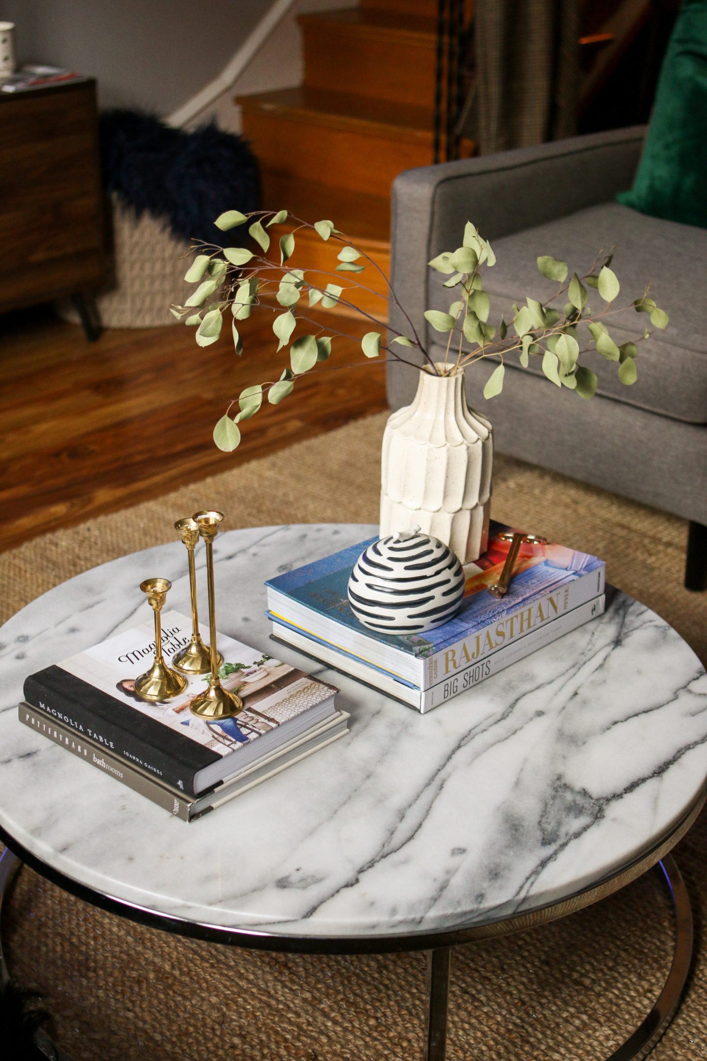 How to Decorate a Round Living Room Table