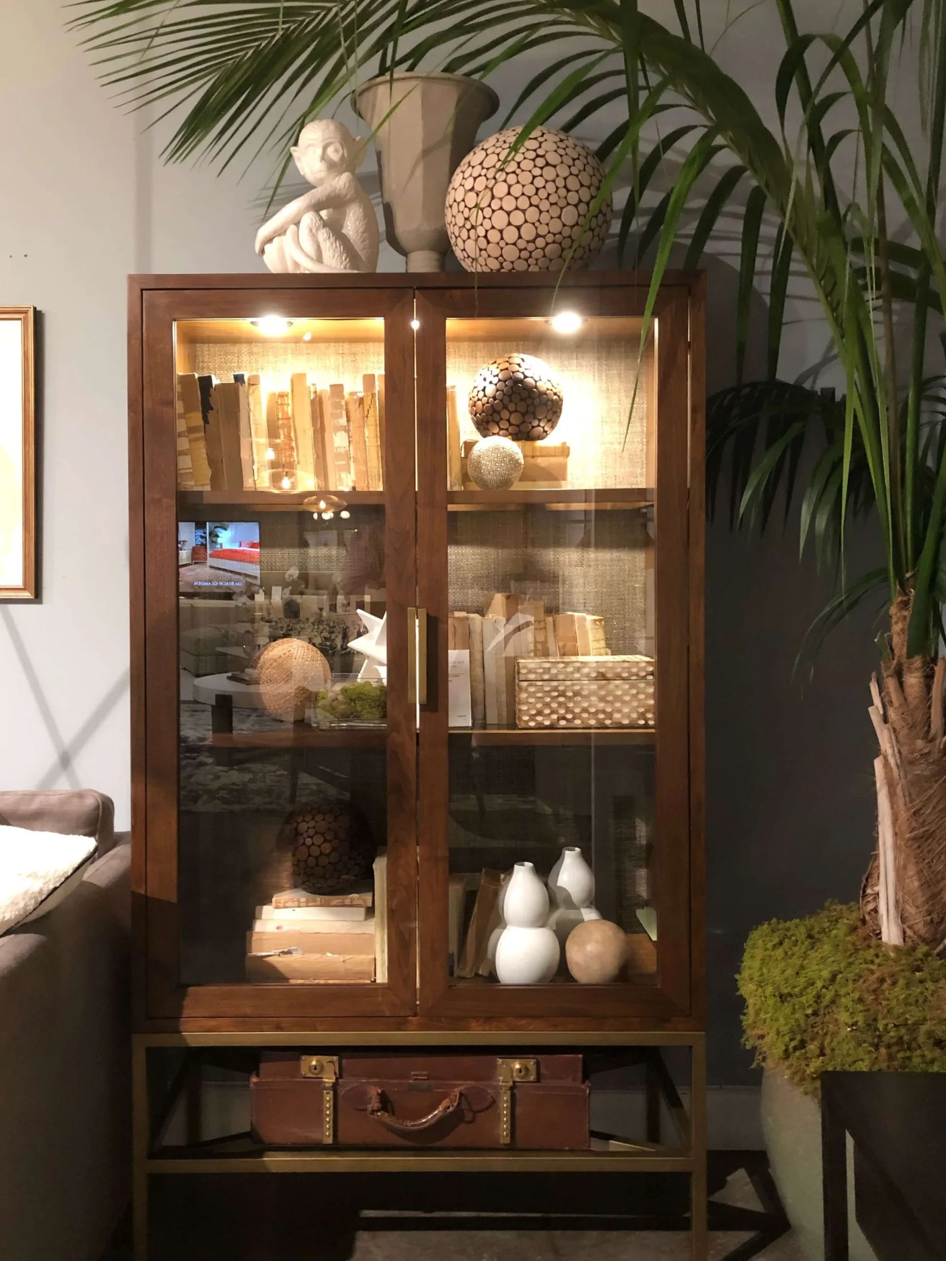 How to Decorate the Top of a Tall Cabinet